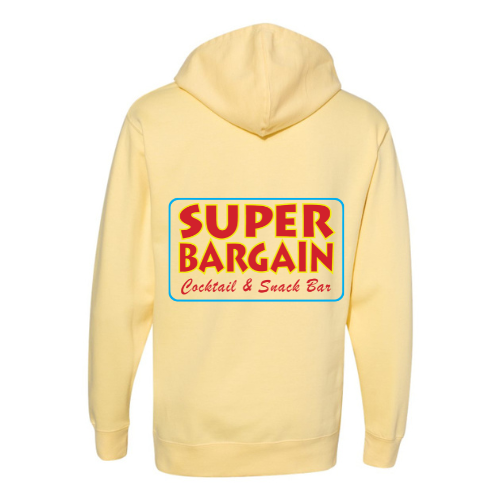 The Super Bargain Logo 'Gap' Hoodie, a light yellow super soft sweatshirt made from a comfortable cotton polyester blend, is shown from the back featuring a colorful rectangular logo. The logo showcases "Super Bargain" in bold, red, 3D text with "Cocktail & Snack Bar" in smaller, cursive red text below on a blue-bordered white and yellow background.