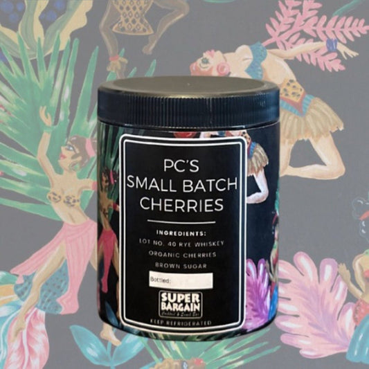 Small batch whiskey-soaked cherries in 6oz glass jar for Manhattans and Old Fashioneds