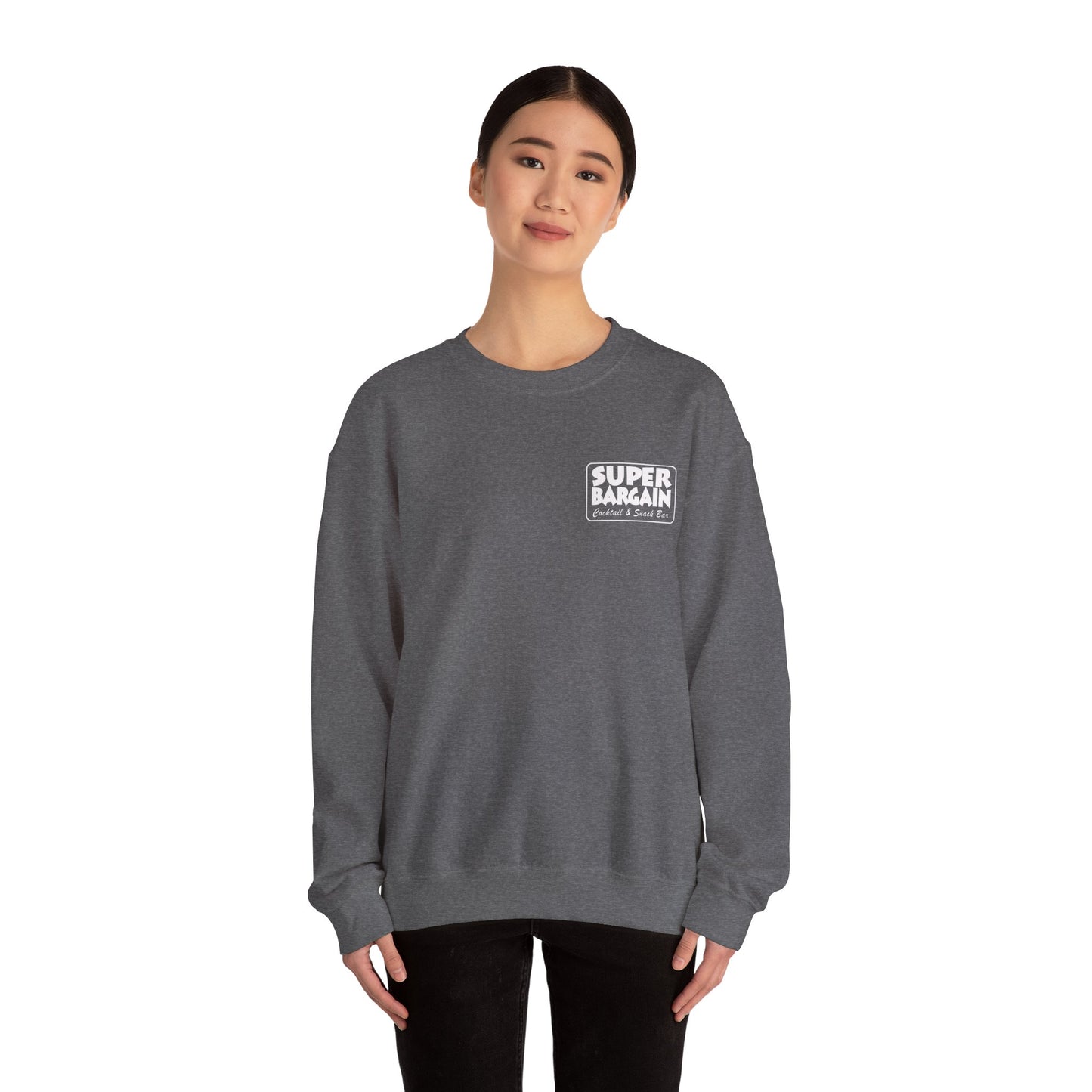 A woman wearing a gray Unisex Heavy Blend™ Crewneck Monochrome Logo Sweatshirt with the text "SUPER BARGAIN" on the front, standing against a white background in Cabbagetown, Toronto by Printify.