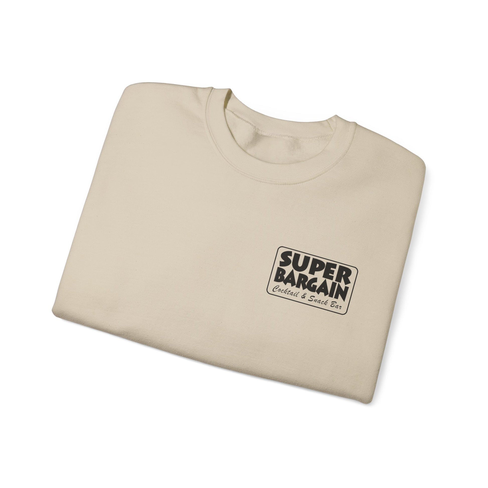 A folded beige Unisex Heavy Blend™ Crewneck Monochrome Logo Sweatshirt with a black "Super Bargain - Great & Small" logo on the left chest area, isolated on a white background, featuring "Toronto" below the main logo.