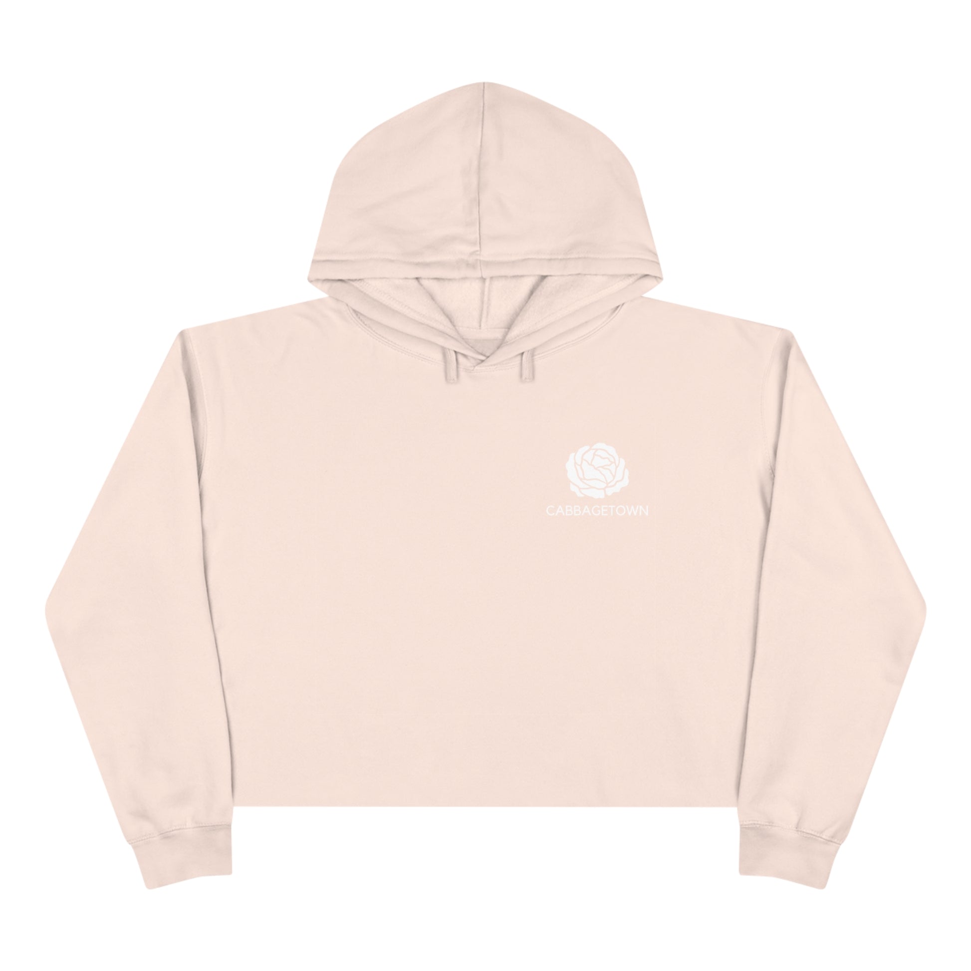 A pale pink Crop Hoodie with Monochrome Cabbagetown and Super Bargain Logo on the left chest area, displayed on a plain white background.