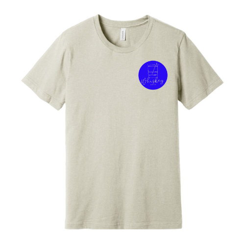 Introducing the "I Like My Whiskey Neat Tee" from Super Bargain: a plain, light beige t-shirt featuring a small blue circular logo on the left side of the chest. The logo includes artistic text and a simple design. This soft, unisex tee offers unparalleled comfort and style at an irresistible price.